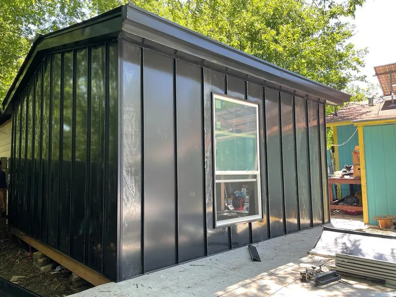 Black standing seam metal wall panels for Metal Roof Installation in Hobart